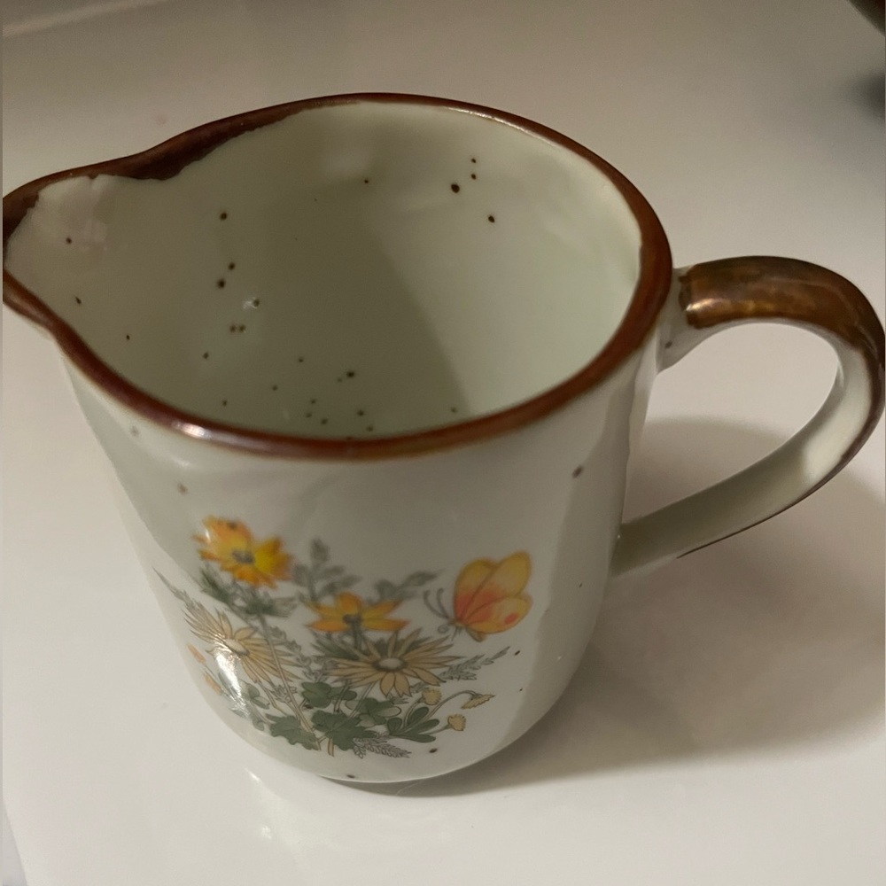 Small cream pitcher.